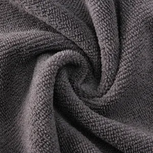 Textura de toalla de microfibra gris oscuro para mascotas, tela absorbente de secado rápido.