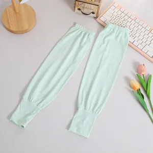 Detailed view of light green summer ice silk sun protection sleeves, long breathable arm guard.