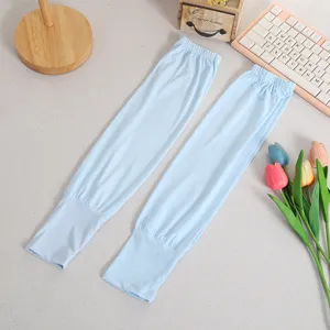 Detailed view of light blue ice silk sun protection sleeves, breathable arm covers for summer.