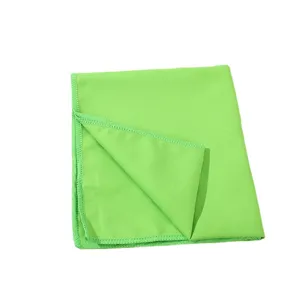 Portable solid color quick dry sports towel for outdoor fitness cooling and sweat absorption.