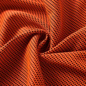 Orange and black mesh cooling towel for outdoor sports, portable fitness sweat absorbent fabric.