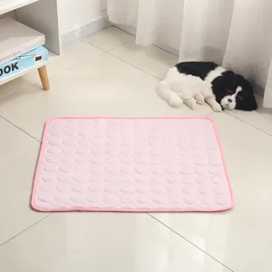 Pink pet cooling mat for dogs and cats, summer breathable ice silk sleeping pad for pets.