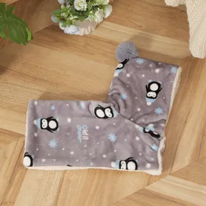Thick pet cloak blanket with cute penguin print and warm fleece lining for winter use.