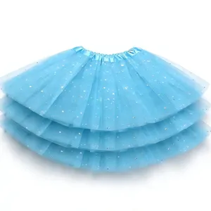 Close-up details of the sparkling star tutu skirt with layered mesh for kids dance wear.