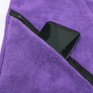 Purple microfiber sports towel with secure zipper pocket, quick drying fitness gear.