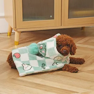 Detailed view of cute pet winter cloak, green white plaid thick warm puppy clothes.