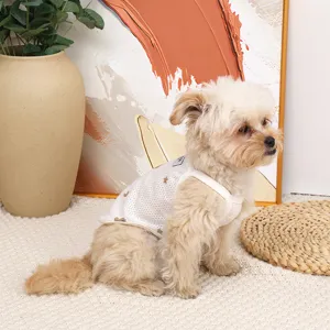 Cute breathable mesh dog vest with cute star print, perfect summer pet clothing for small dogs.