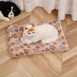 Thickened flannel pet blanket soft cat dog sleeping mat with cute paw print design for winter warm.
