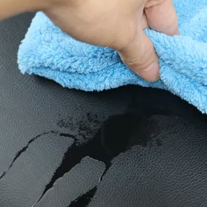 Blue microfiber car cleaning towel, soft ultra-absorbent automotive washing cloth.