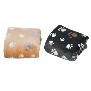 Soft flannel pet blanket with cute paw print design, warm and comfortable multi-use cover.