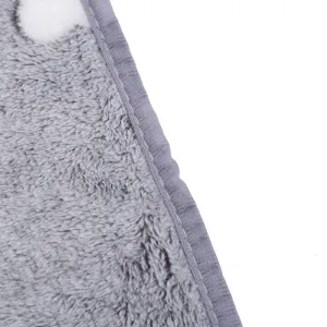 Close-up detail of grey fleece pet blanket showing soft texture and neat bound edge.