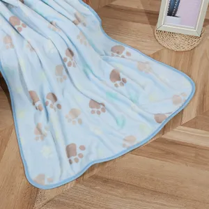 Soft flannel pet blanket with cute paw print design, warm and cozy for cats and dogs daily use.