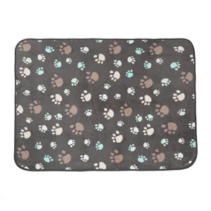 Soft flannel pet blanket with cute paw print pattern, warm and cozy for cats and dogs daily use.