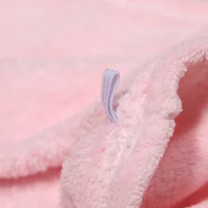 Pink coral fleece dry hair cap detail showing elastic loop, soft and absorbent microfiber towel.