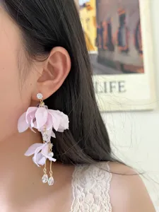 Chic pink fabric flower dangling earrings with crystals and pearls, elegant vacation style.