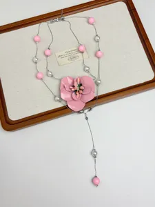 French romantic style long layered necklace with pink flower pendant and pearls for women fashion.