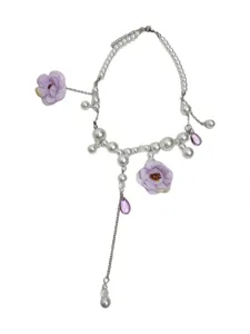 Detailed view of the elegant Korean pearl necklace featuring lovely purple fabric flowers.