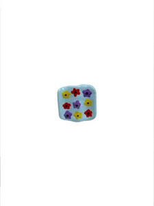 Detail view of a sweet blue drip oil ring featuring colorful small flower patterns for women.