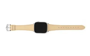 Beige lychee grain leather watch strap compatible with Apple Watch, waist design, detail view.
