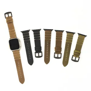 Vista detallada de correas de reloj de cuero de caballo loco genuino con hebillas negras.
