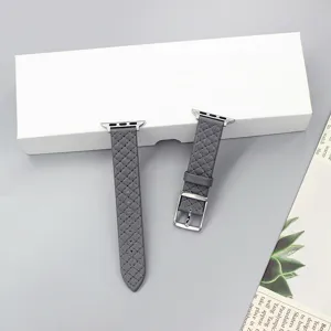 Grey quilted genuine leather watch strap detail view, elegant accessory for smart watch.