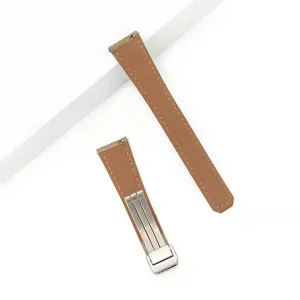 Brown leather watch strap replacement with stainless steel deployment clasp, premium cowhide.