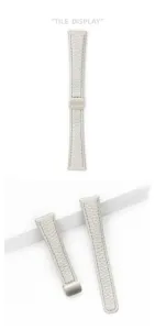Detailed view of the starlight leather watch strap showing texture and magnetic folding buckle.
