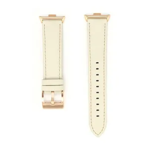 Cinturino per orologio in pelle beige vista dettagliata fine, elegante fibbia in metallo.
