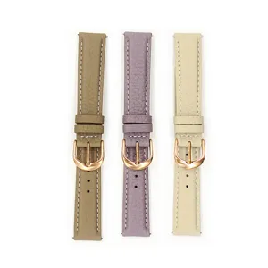 Genuine leather watch strap with lychee pattern and rose gold buckle, stylish accessory.