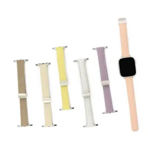 Slim genuine leather watch strap compatible with Apple Watch, featuring a magnetic metal buckle.