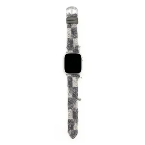 Cinturino di ricambio in tessuto quadrettato e pelle per Huawei Watch FIT 4 e FIT 4 Pro.