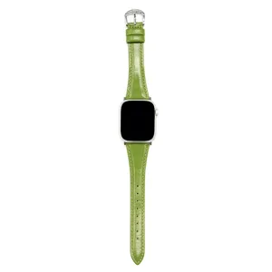 Green leather watch strap compatible with Apple Watch, stylish replacement band.
