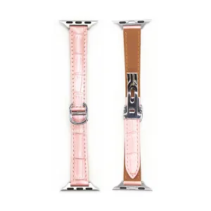 Cinturino in pelle coccodrillo rosa per Apple Watch con fibbia a D e chiusura in metallo.