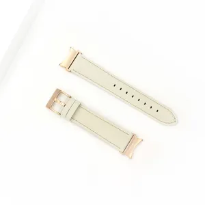 Genuine leather watch strap detail view, elegant off-white design with rose gold hardware.