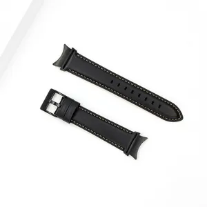Detailed view of black genuine leather watch strap replacement with curved ends and buckle.