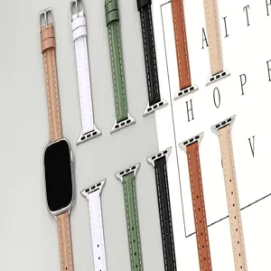 Vue détaillée de bracelets de montre en cuir fin de plusieurs couleurs avec boucles métal.