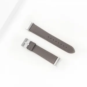 Grey genuine leather watch band replacement strap with metal buckle and curved ends.