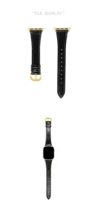 Cinturino in pelle nera con fibbia dorata, finitura in pelle oleata, elegante accessorio.