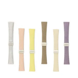 Close-up of assorted multi-color genuine leather watch straps featuring secure magnetic clasps.