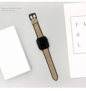 Cinturino in pelle retro con fori traspiranti, compatibile con accessori Apple Watch.