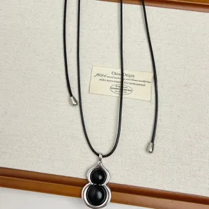 Black gourd long necklace pendant for women, elegant fashion statement jewelry accessory new.