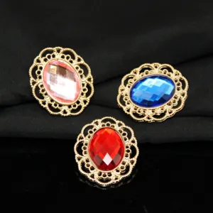 Detailed shot of Korean alloy lace oval rhinestone gemstone DIY buttons for hair and clothing.