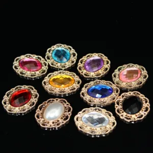 Close-up detail of oval rhinestone alloy button, sparkling gemstone for DIY craft decoration.