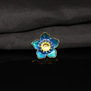 Squisito fiore in smalto blu accessorio fai da te con dettagli dorati per forcine.