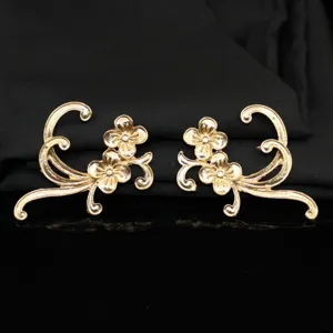 Exquisite detail shot of gold-plated alloy Hanfu hair accessory featuring floral branch motifs.