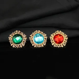 Close up of alloy lace rhinestone round gem buttons, ideal for DIY crafts, shoes and hair decor.