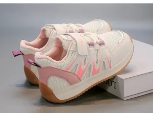 Close-up of children's breathable mesh sports shoes with pink and white accents.