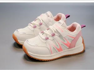 Close-up detail of breathable mesh and stylish pink accents on white toddler sneakers