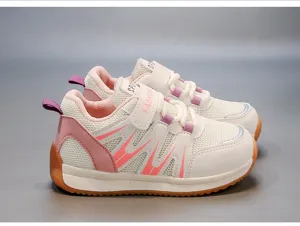 Breathable pink and white children's mesh sneakers with soft gum soles.