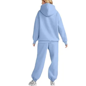 Set due pezzi felpa con cappuccio e pantaloni sportivi azzurro chiaro per la donna